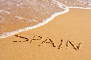 Moving to spain name in sand