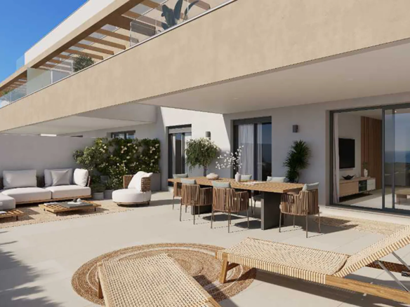 Large ground floor terrace with outdoor lounge area in Almare Cala de Mijas residential complex