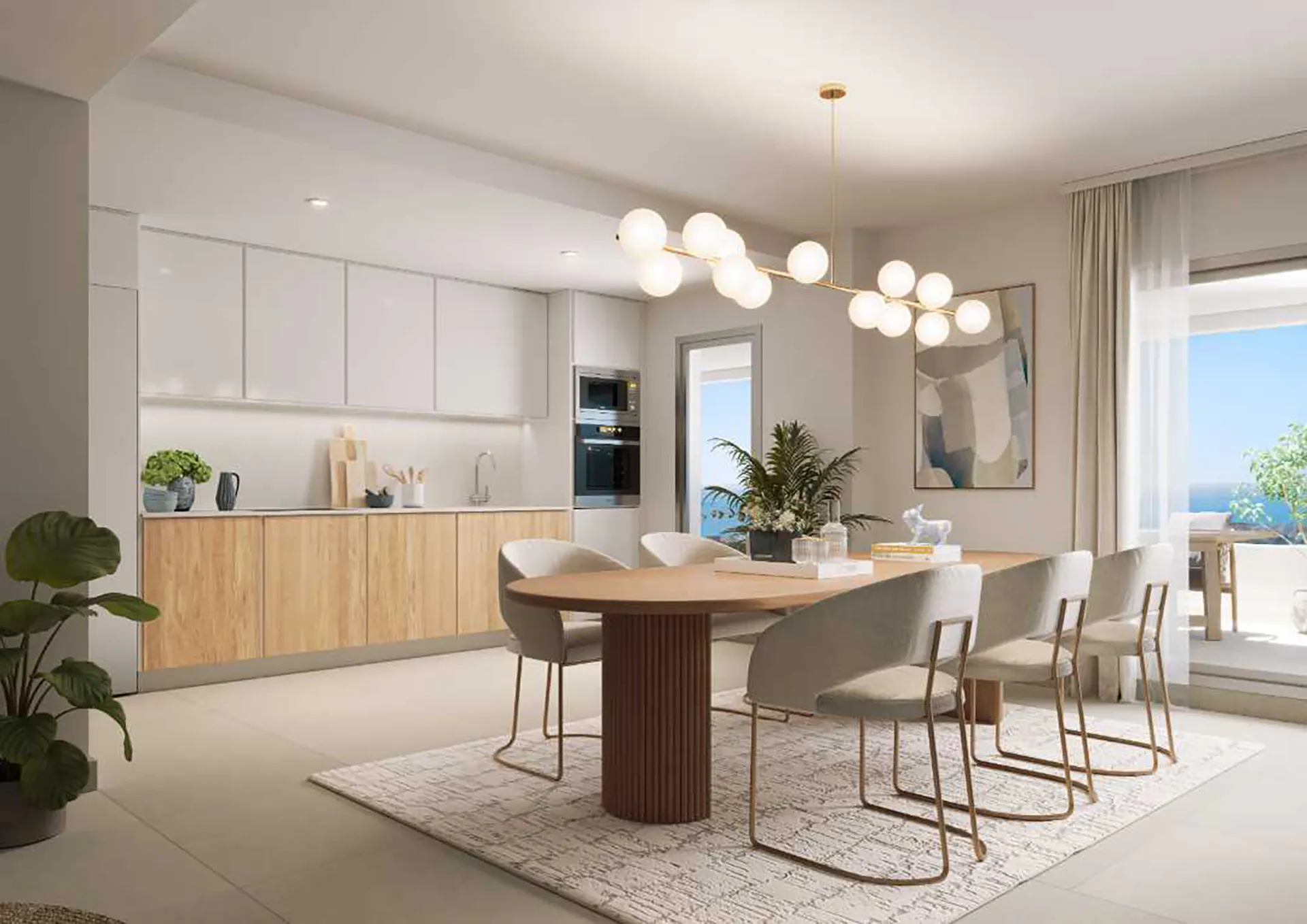 Modern open-plan kitchen and dining area in Almare Cala de Mijas apartment with minimalist design and natural light