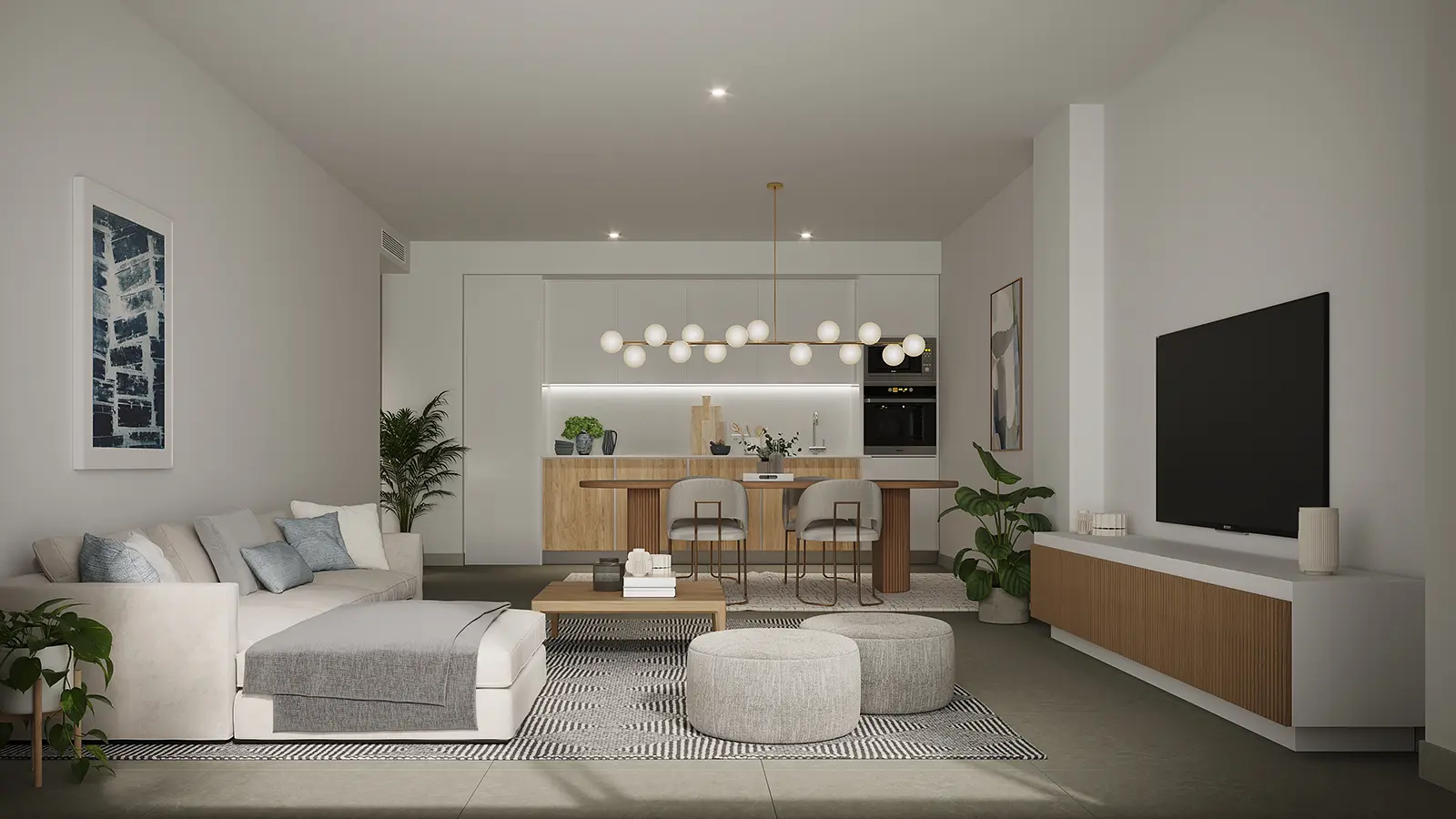 Lichte open woonkamer met witte bank, salontafel en keuken met hanglampen op de achtergrond