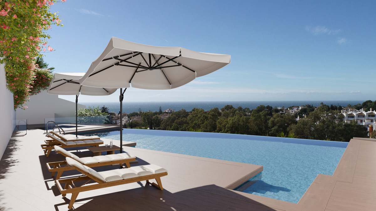 Aalto Residences – Riviera del Sol - infinity-pool på taget med solsenge og panoramaudsigt over havet