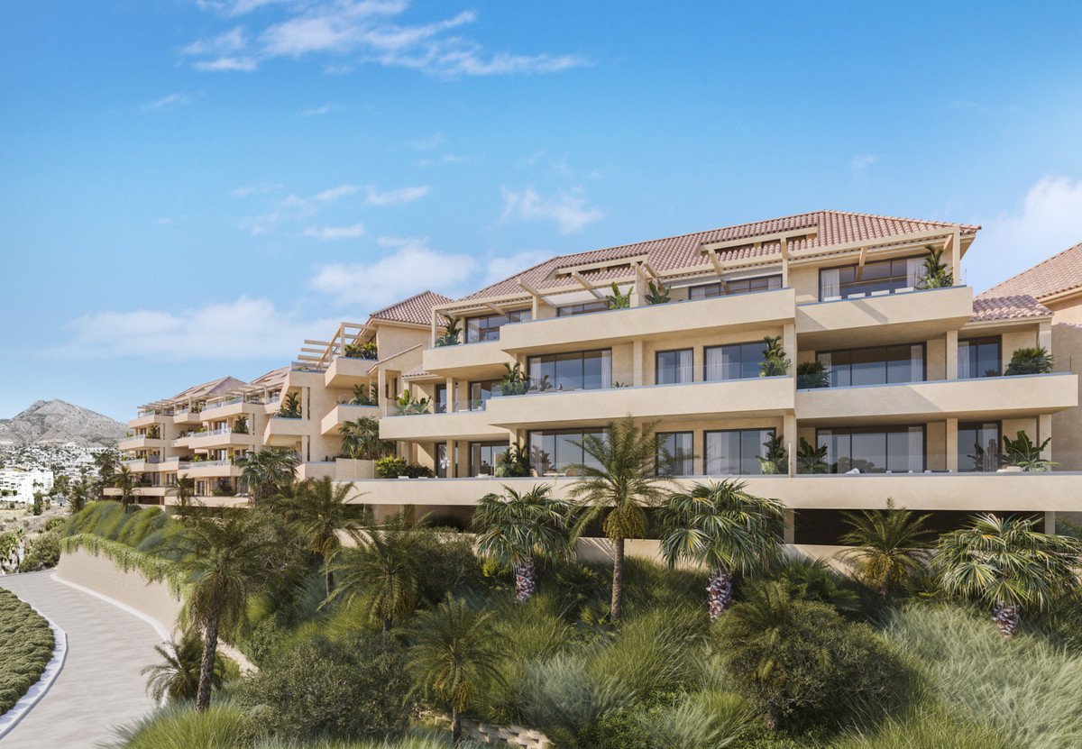 Abelias – Benalmadena - luxury new-build apartment complex with tiered terraces, palm trees and terracotta rooftops on the Costa del Sol
