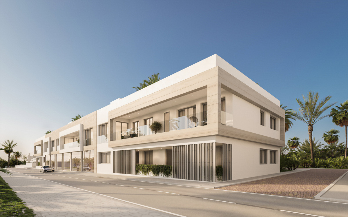 Alcantara del Mar Apartments – San Pedro de Alcántara - modern two-storey white facade with balconies and palm trees