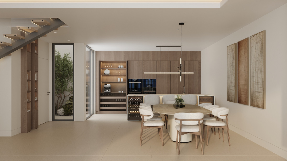 Alcantara del Mar Townhouses – San Pedro de Alcántara - eleganter offener Essbereich mit Weinschrank und Holzeinbauschränken