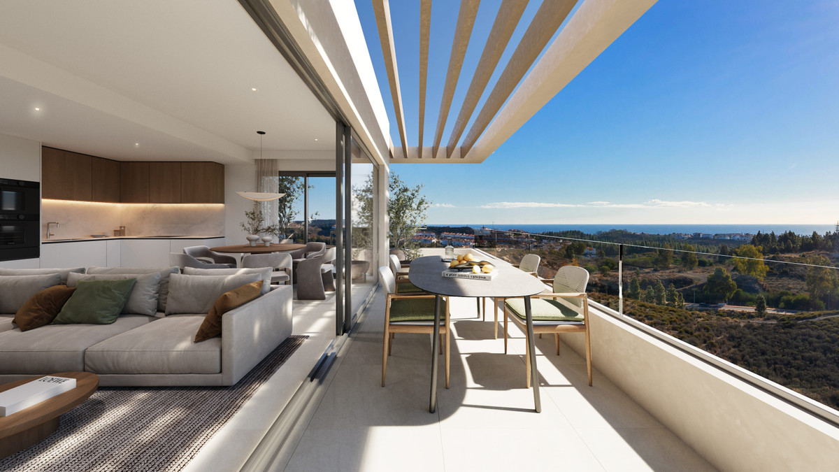 Altos del Chaparral – Mijas Costa - sunny terrace with outdoor dining table and panoramic sea views over the Costa del Sol