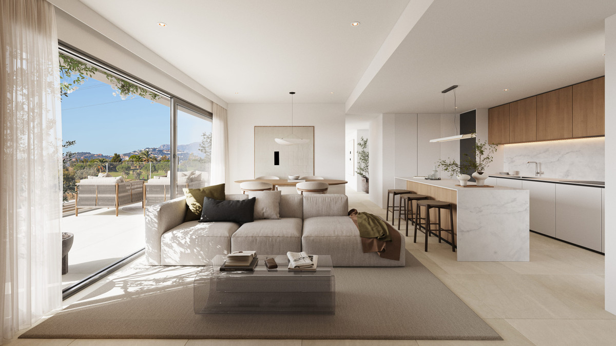 Altos del Chaparral – Mijas Costa - open-plan living room and kitchen with marble island and terrace views