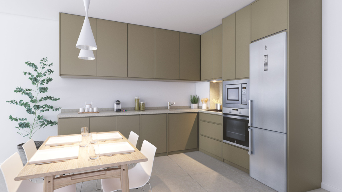 Amphora Beach Fase IV – Manilva - moderne offene Küche mit olivgrünen Schränken, Einbaugeräten und Essbereich