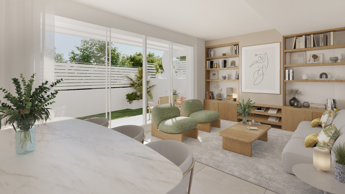 Anna De Estepona – Apartments – Estepona - bright open-plan living room with green armchairs, wooden shelving and garden terrace access