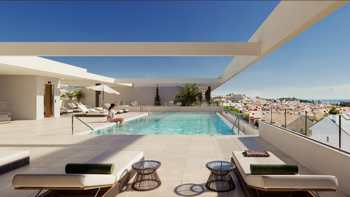 Astra Homes – Fuengirola - rooftop infinity pool terrace with panoramic views over Fuengirola and the Mediterranean coast
