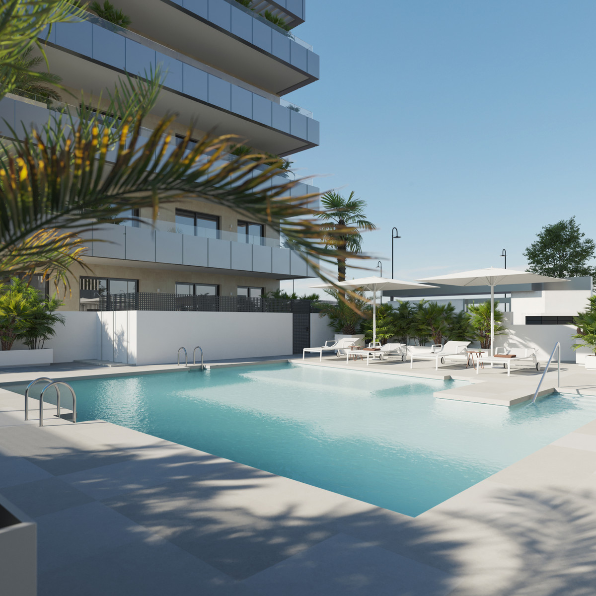 Biznaga – Las Lagunas - outdoor swimming pool and sun terrace with loungers beside modern residential tower, Málaga
