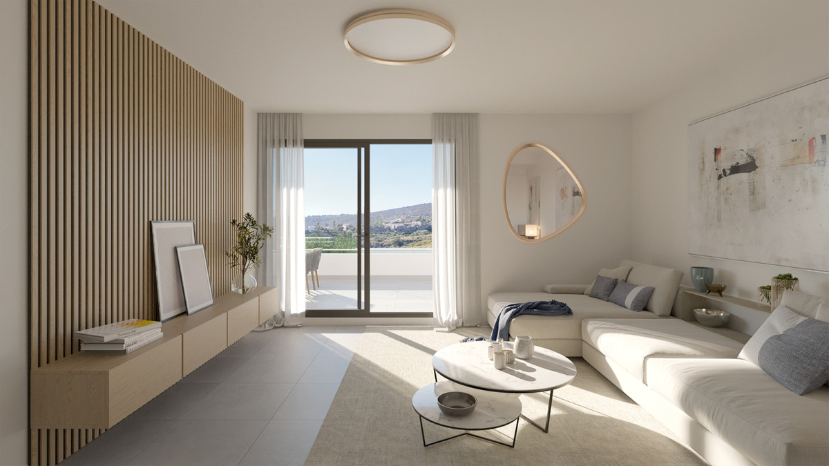 Blue View Heights – Manilva - lichte moderne woonkamer met houten latwand en schuifdeuren naar terras
