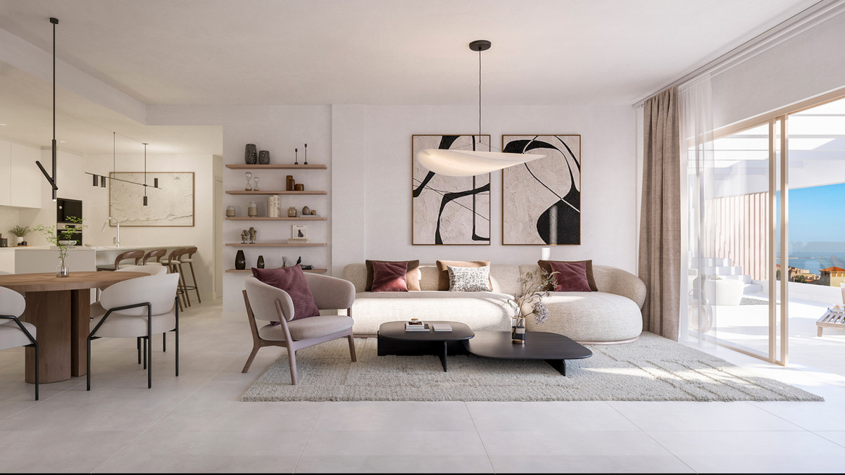 Celestia Homes – Estepona - lyst åbent stue- og spisemiljø med buet sofa, abstrakt kunst og havudsigt fra terrasse