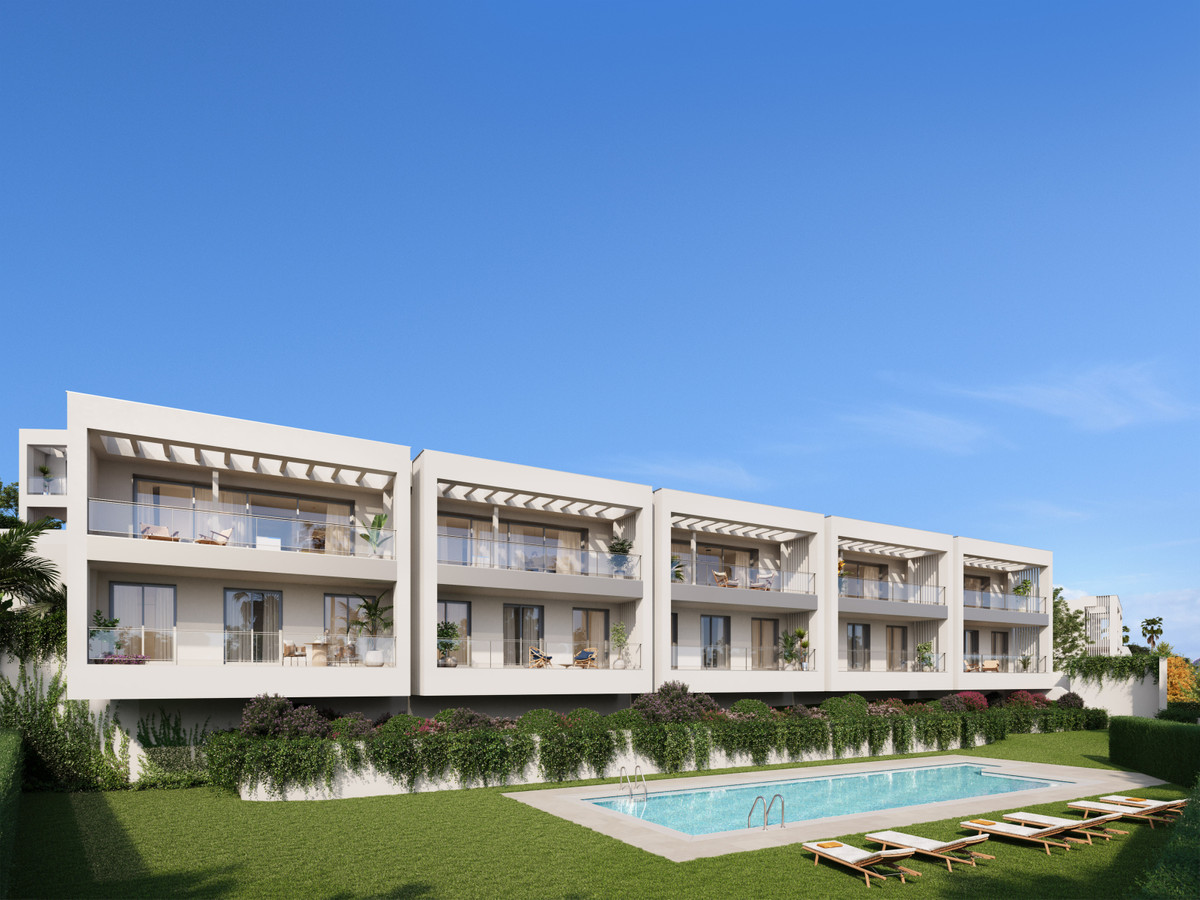 Estrella del Mar Villas Marbella – Marbella - exterior facade with communal pool, sun loungers and landscaped gardens