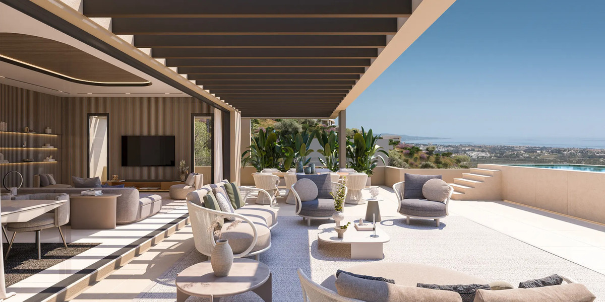 Finca de Jasmine Sky Villas – Benahavís - sun-drenched terrace with outdoor lounge seating, pergola and panoramic sea views