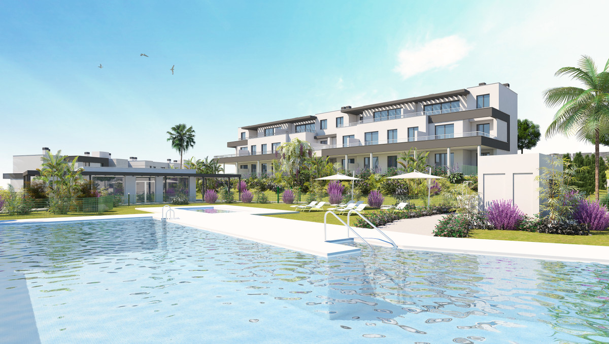 Habitat Valle Romano – Estepona - moderne boligkompleks med fælles pool, frodige haver og palmtræer