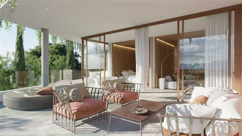 Higueron North Residences – Apartments – Fuengirola - luksusterrasse med loungesæder, glasskydedøre og frodig haveudsigt