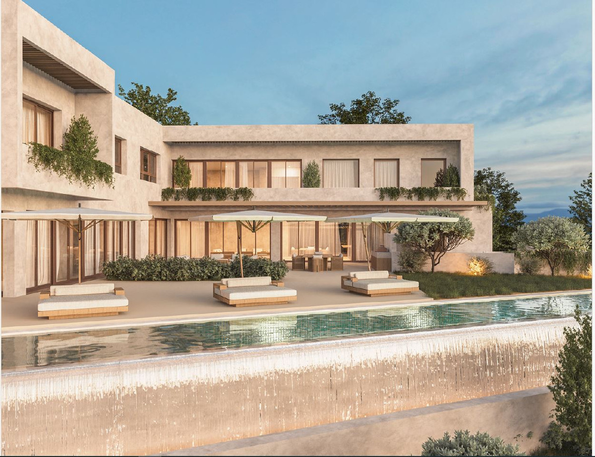 HL SG122 – Alhaurín el Grande - luxury exterior with infinity pool, sun loungers, and terraced gardens at dusk