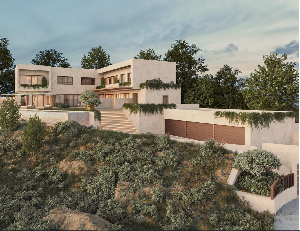HL SG122 – Alhaurín el Grande - hillside luxury villa exterior with terraced gardens, stone staircase, and double garage