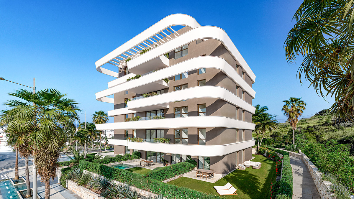 Looa Estepona – Estepona - curved white balconies on modern luxury apartment building with landscaped garden and pool