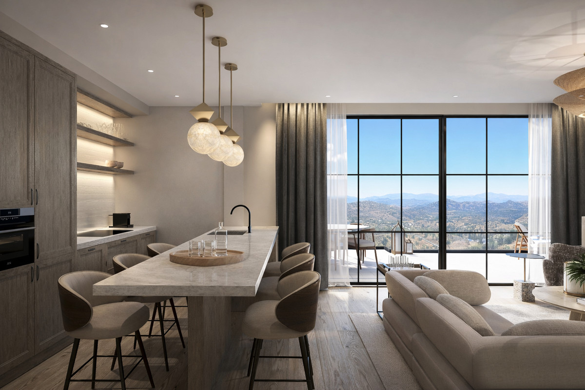 Luna Nova Residences – Lejligheder – Guaro - åbent køkken og stue med marmorø og panoramaudsigt over bjergene