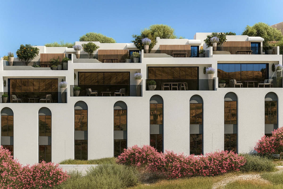 Luna Nova Residences – Townhouses – Guaro - hvid facadeudvendig med buevinduer, terrasser og taghaver