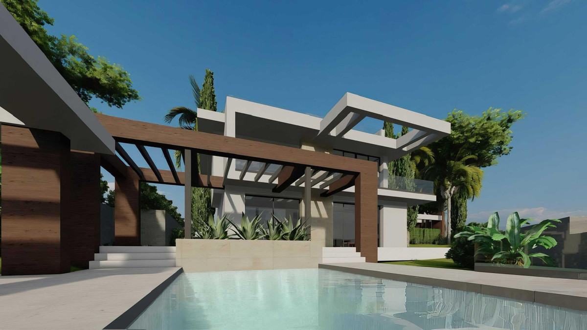 Mandaluz 1 – Río Real - modern luxury villa exterior with pool, pergola, and tropical landscaping under blue sky