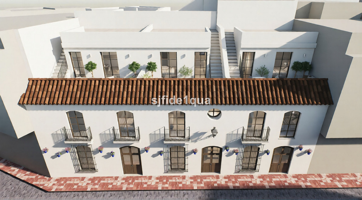 Maria Caridad – Estepona - rendered exterior facade with terracotta roof, balconies, and rooftop terrace of new development