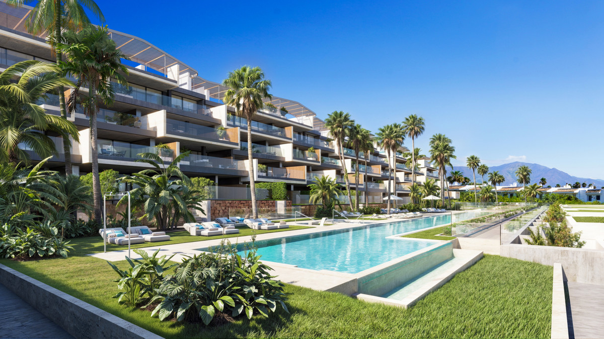 Nubay – Manilva - luksuriøs nybygget facade med infinity-pool, palmætræer og terrasserede lejligheder på Costa del Sol