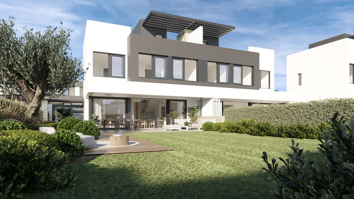 Serene Atalaya – Phase 1 – Atalaya - moderne witte villa met weelderige tuin, houten terras en grote beglaasde woonruimte op de begane grond