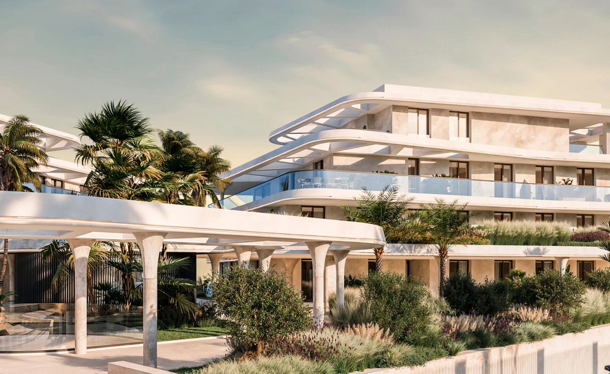 Solaia – Bel Air - luxe nieuwbouw exterieur met gebogen witte gevels, glazen balkons en aangelegde tuinen met palmbomen