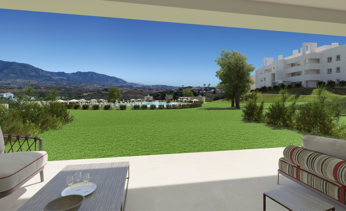 Solana Village – La Cala Golf - terrasse med have, pool og bjergudsigt under klar blå himmel