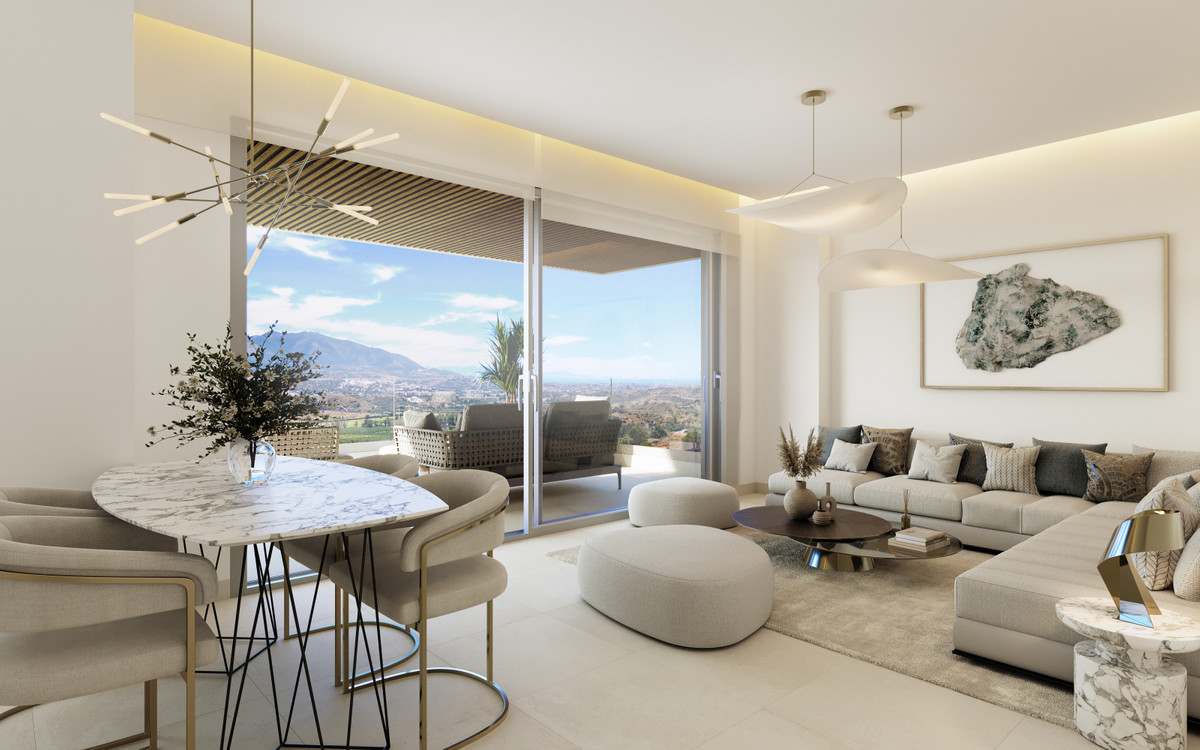 Sunrise Golf Residences – La Cala de Mijas - lichte open woon- en eetkamer met panoramisch uitzicht op bergen en vallei