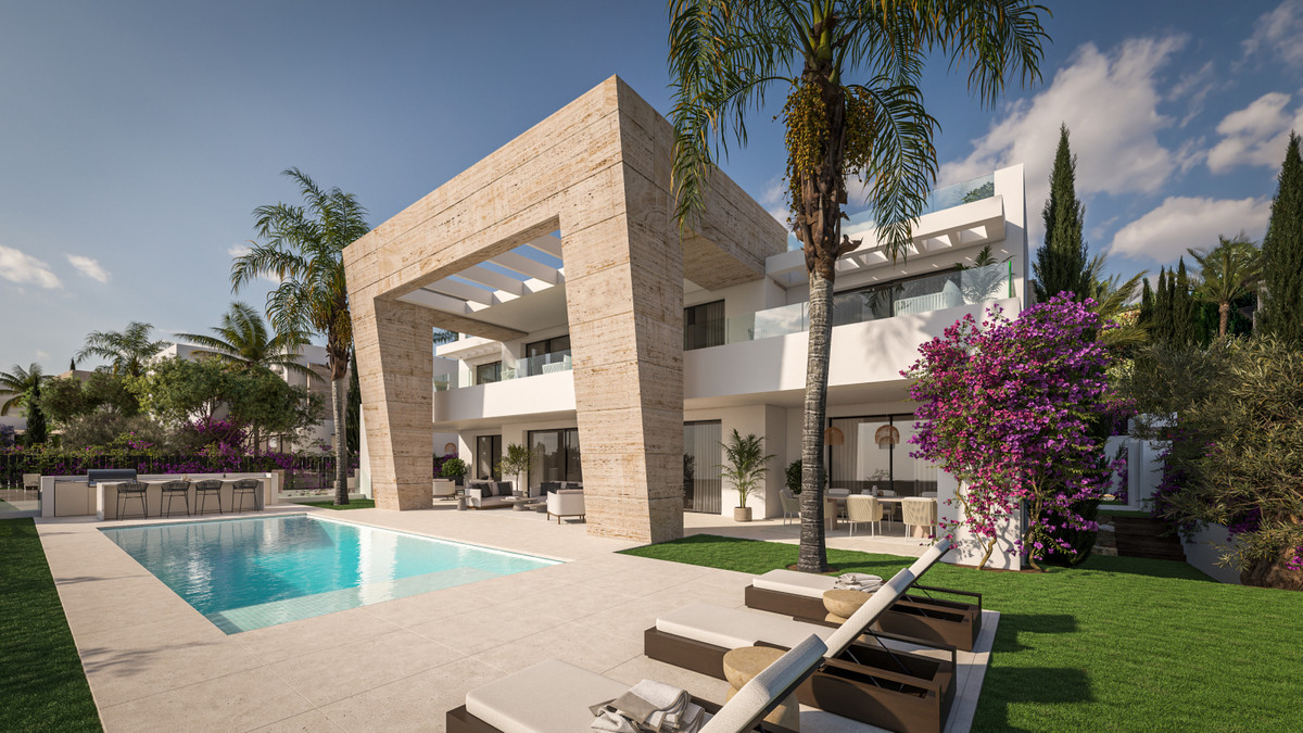 The Club Villas – Estepona - modern luxury villa exterior with pool, sun loungers, tropical gardens and travertine stone arch feature