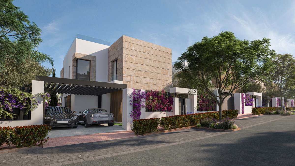 The Club Villas – Estepona - modern luxury villa exterior with stone facade, carport, and bougainvillea-lined white boundary walls