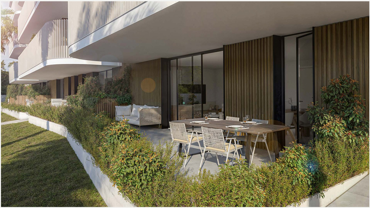 The Oak 48 – Estepona - ground-floor terrace with outdoor dining set, lush garden borders and floor-to-ceiling glazed façade