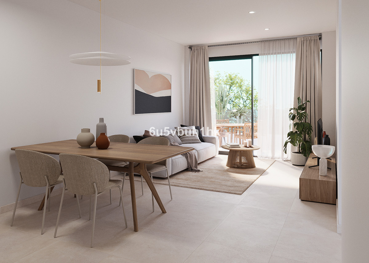 Torreblanca Heights – Fuengirola - bright open-plan living and dining area with terrace access and natural light