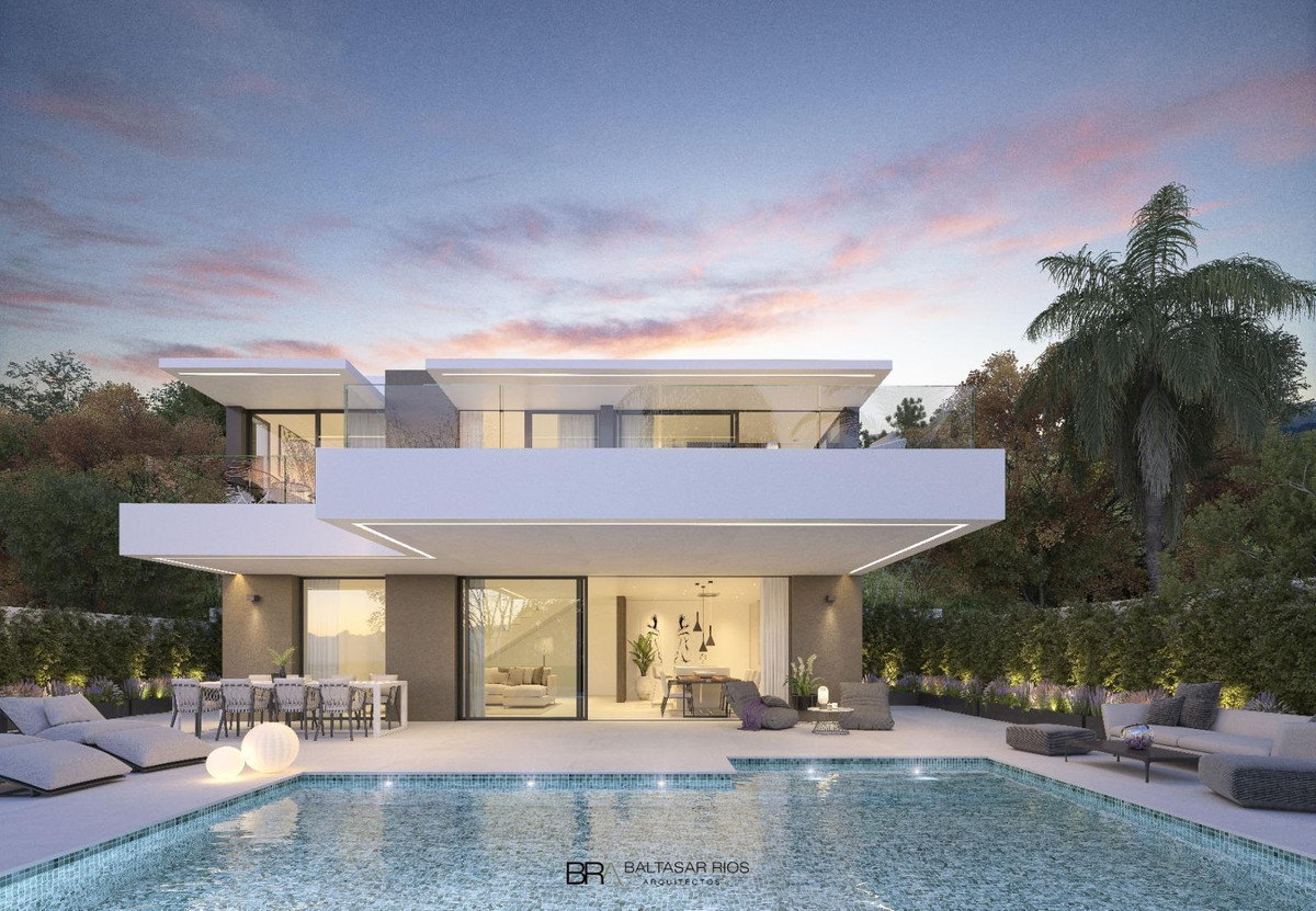 Villa Alcalá del Valle – Coín - moderne zweistöckige Villa mit beleuchtetem Pool, Terrassensitzbereich und offenem Wohnbereich in der Abenddämmerung