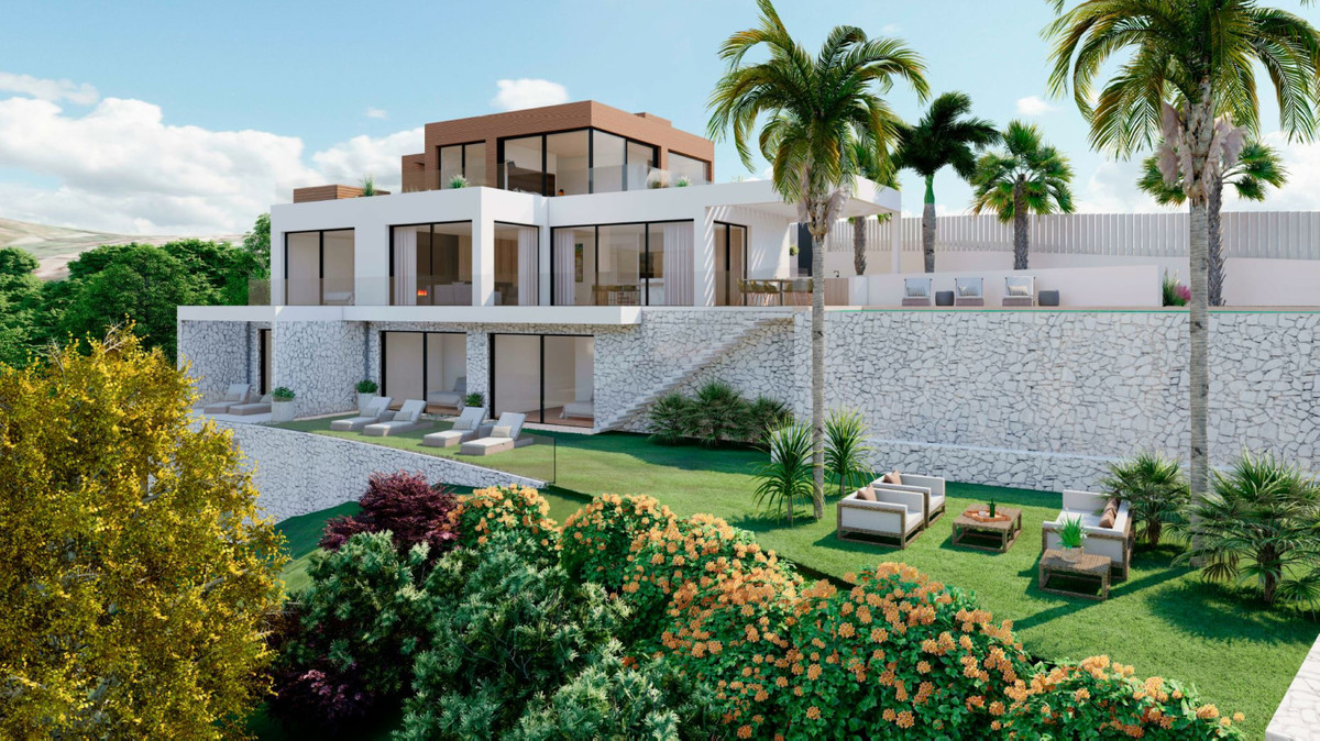 Villa Ana – Artola – moderne Luxusvilla mit gepflegtem Garten, Natursteinmauern und Palmen