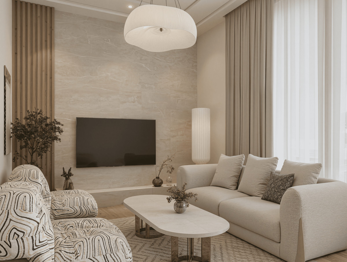 Villa Colombia – Casares – elegantes Wohnzimmer in Neutraltönen mit Marmor-Akzentwand, TV-Möbel und gemusterten Sesseln