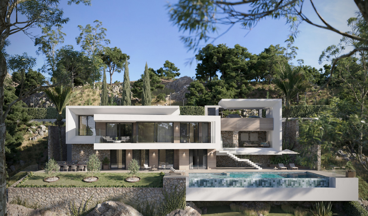 VILLA EVANIA Cortesín – Casares - modern luxe villa exterieur met overloopzwembad, aangelegde tuin en heuvelachtige achtergrond