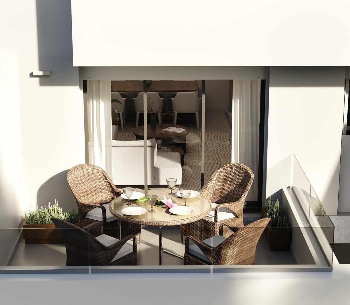 Vistanova 6 – Antequera - solrig terrasse med kurvemøbler, rundt bord og skydedøre i glas