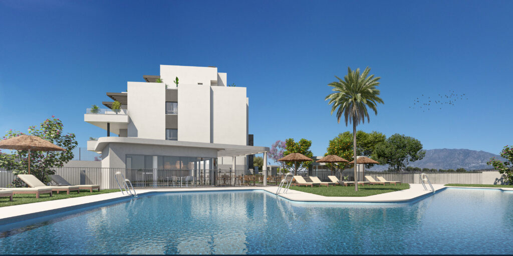 Vitta Marina – La Cala de Mijas - modern white residential building with communal outdoor swimming pool, sun loungers, palm tree and mountain views