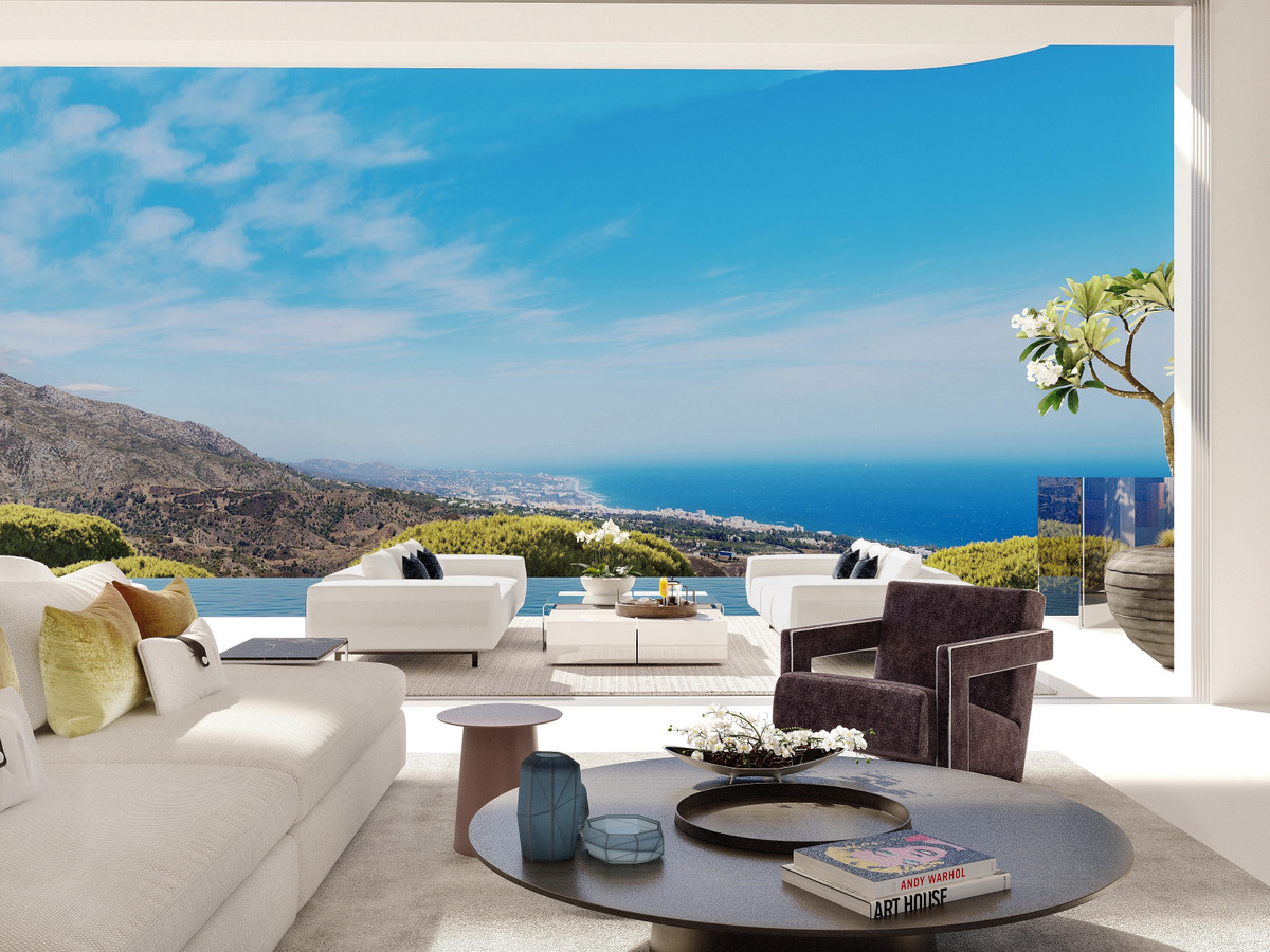 Vista Lago Residences – Benahavís - åben stue med terrasse, havudsigt og bjergbaggrund