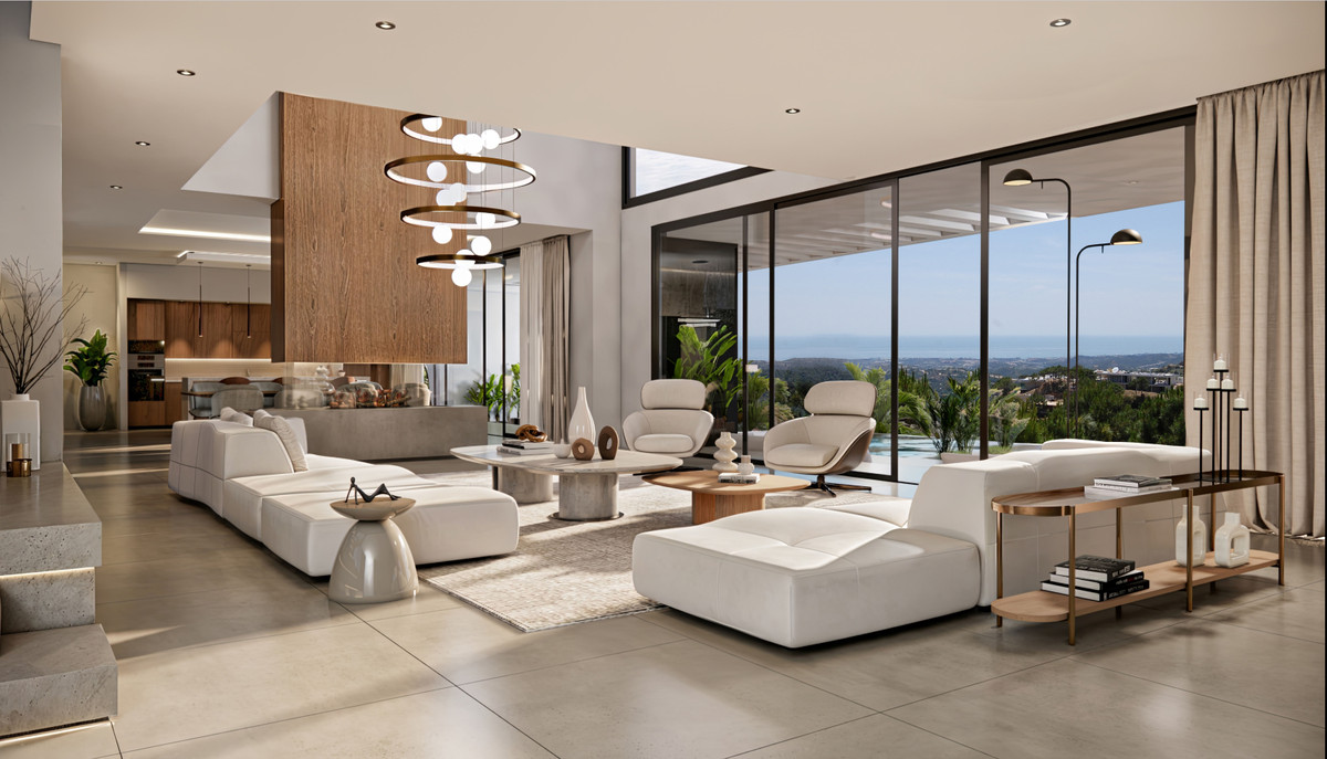 VILLA AKASIA – Benahavís - open woonkamer met witte sofa's, designluchter en panoramische glasdeuren naar poolterras met zeezicht