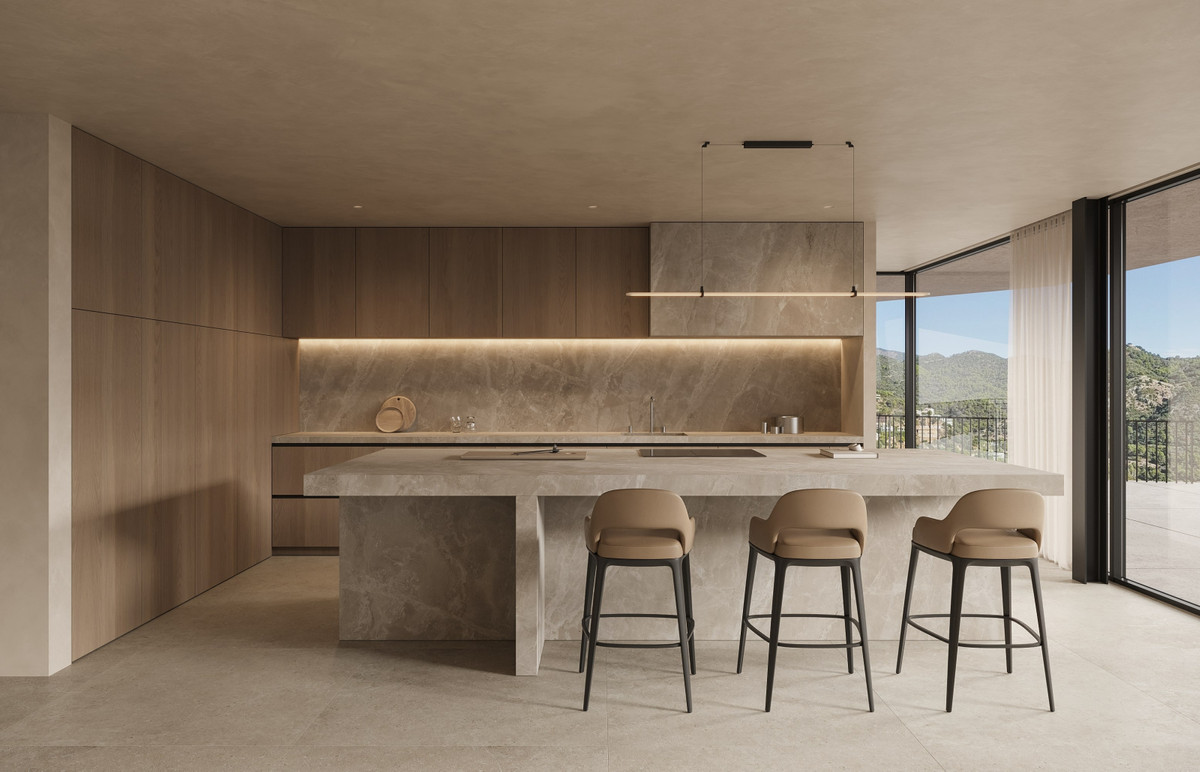 Villa Isola – Benahavís - luxe open keuken met stenen eiland, barkrukken, houten kasten en bergzicht