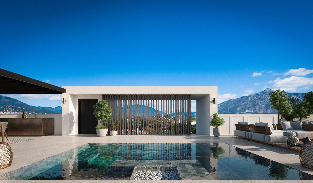 Blume – Marbella - rooftop pool terrace with mountain views and modern pergola structure
