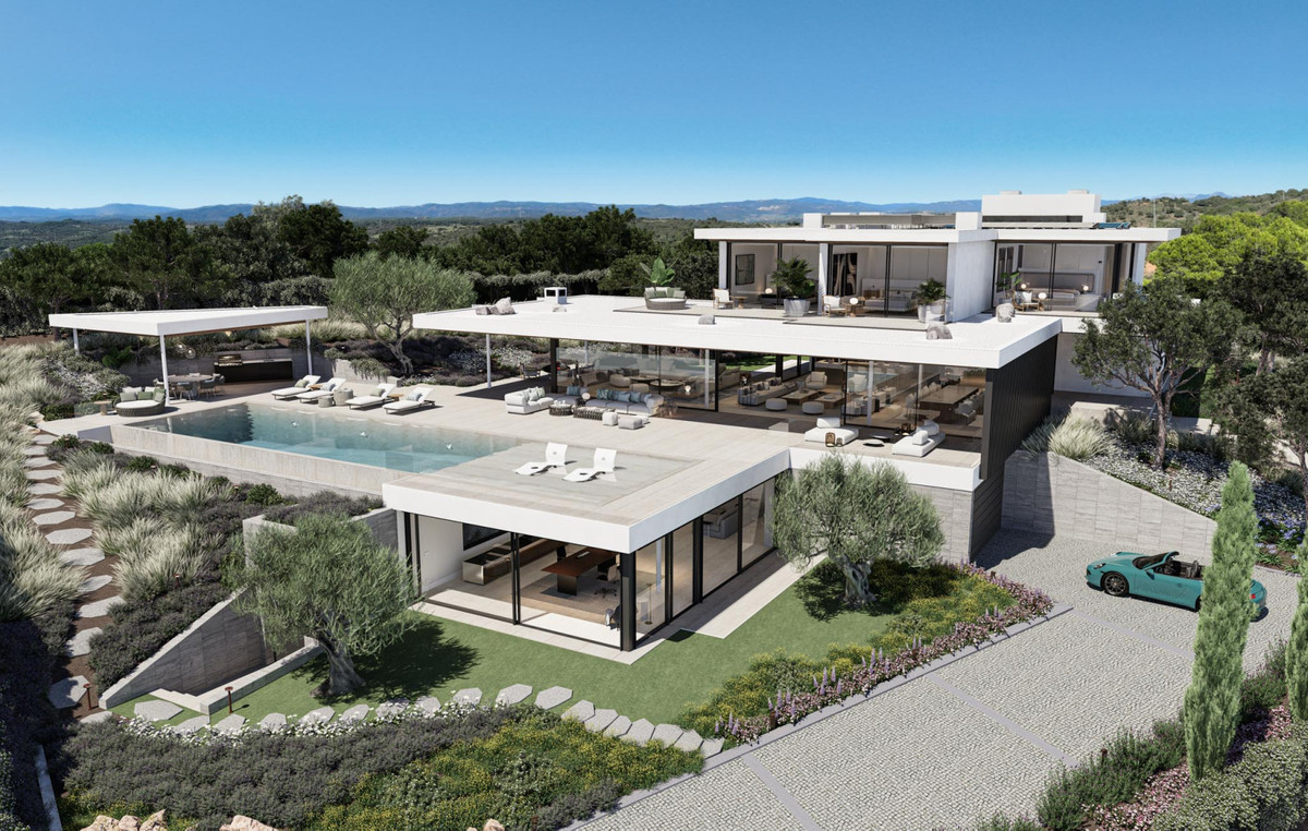 VILLA RETIRO – The Collection – Sotogrande - aerial view of modern luxury villa with infinity pool, terraces and landscaped gardens