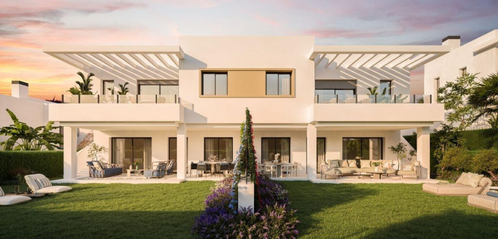 Apron Estepona – Estepona - modern white exterior with lush garden, terraces and pergola at sunset