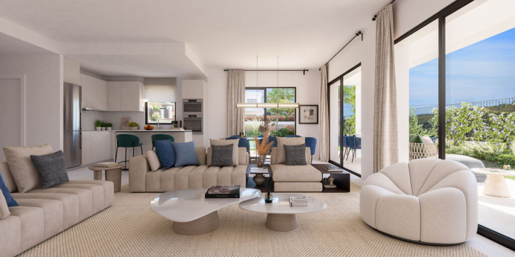 Apron Estepona – Estepona - bright open-plan living room with beige sofas, blue cushions, and floor-to-ceiling windows overlooking a lush garden and sea views