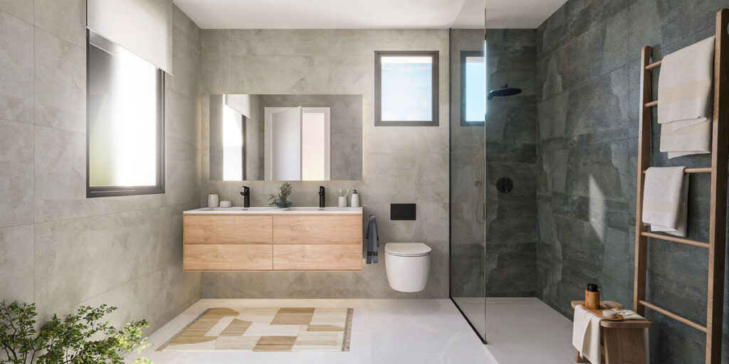 Apron Estepona – Estepona - modern luxury bathroom with double wood vanity, walk-in shower and grey stone tiles